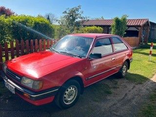 Mazda 323 98.500 km 3.499 &euro; Babenhausen 64832