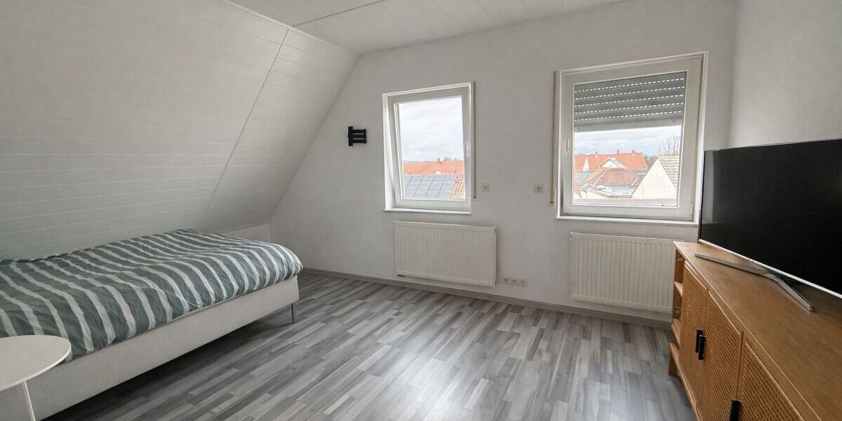 Karben: Modernes 3-Familienhaus im alten Ortskern von Petterweil - Mehrfamilienhaus, Wohnhaus Karben | Angebot:25444335